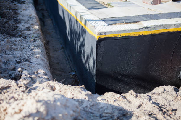 Professional Interior Drainage System technician working in Kewaskum, WI